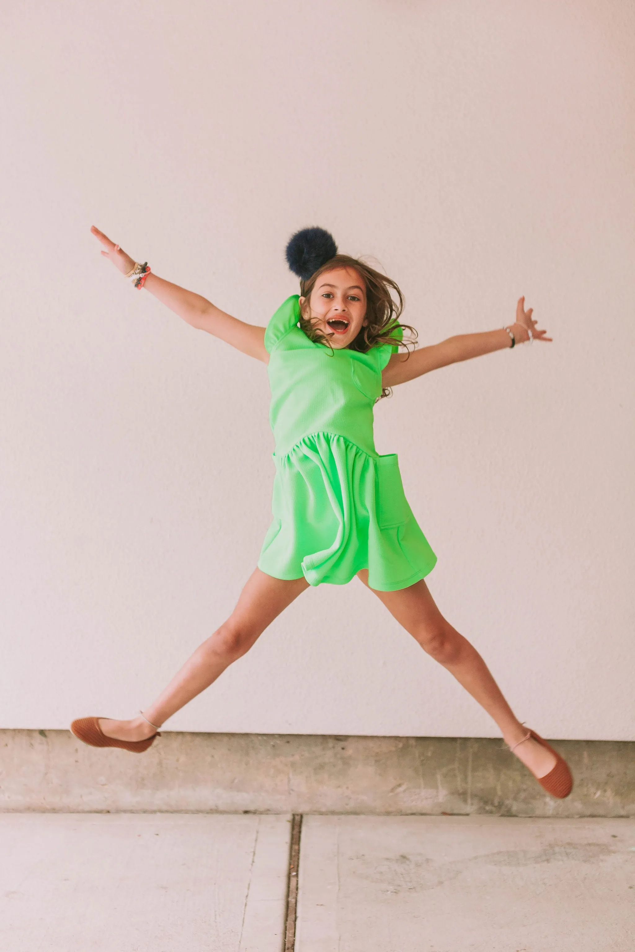 Little Girl's Neon Green Bullet Knit Cotton Three Pocket Dress