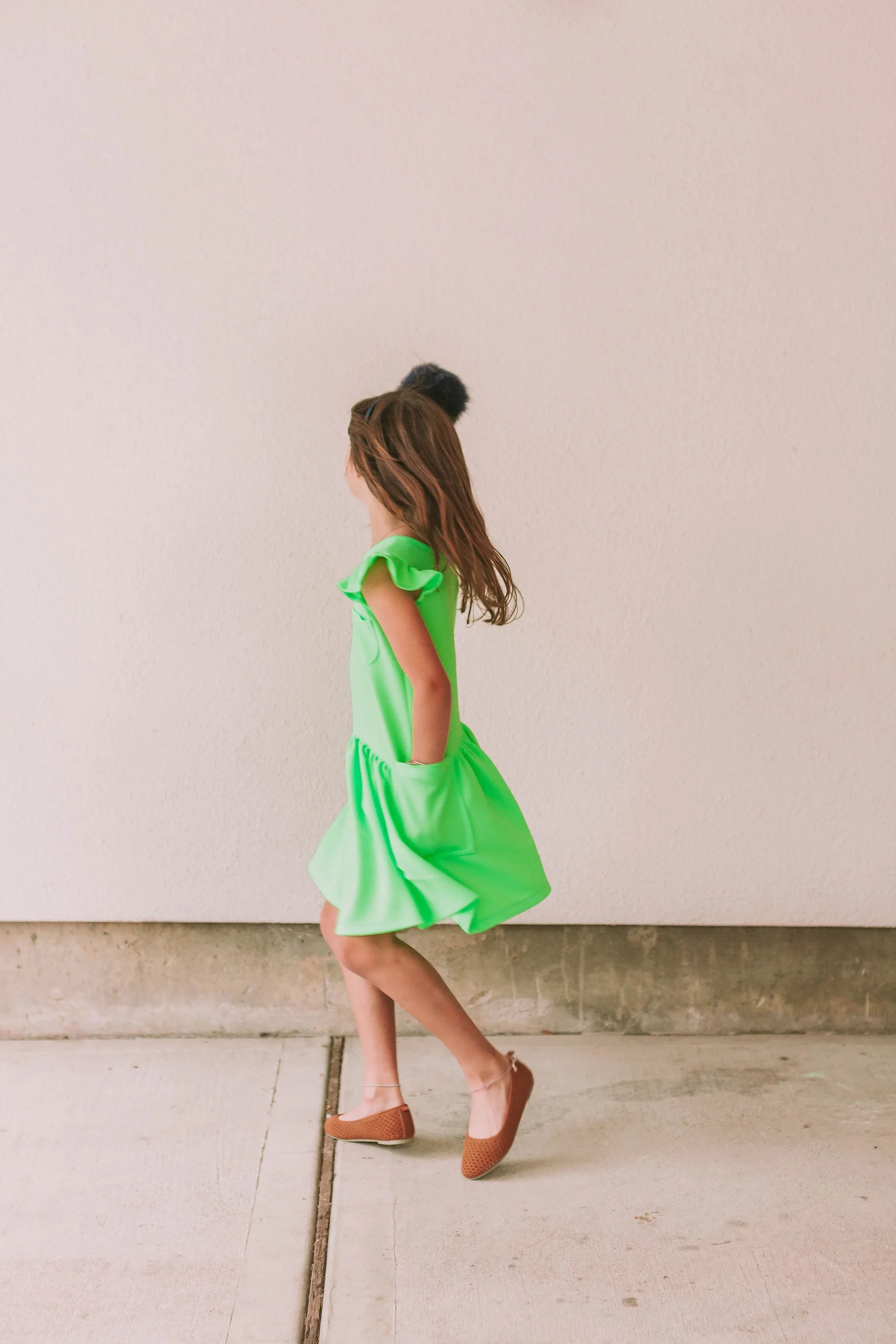 Little Girl's Neon Green Bullet Knit Cotton Three Pocket Dress