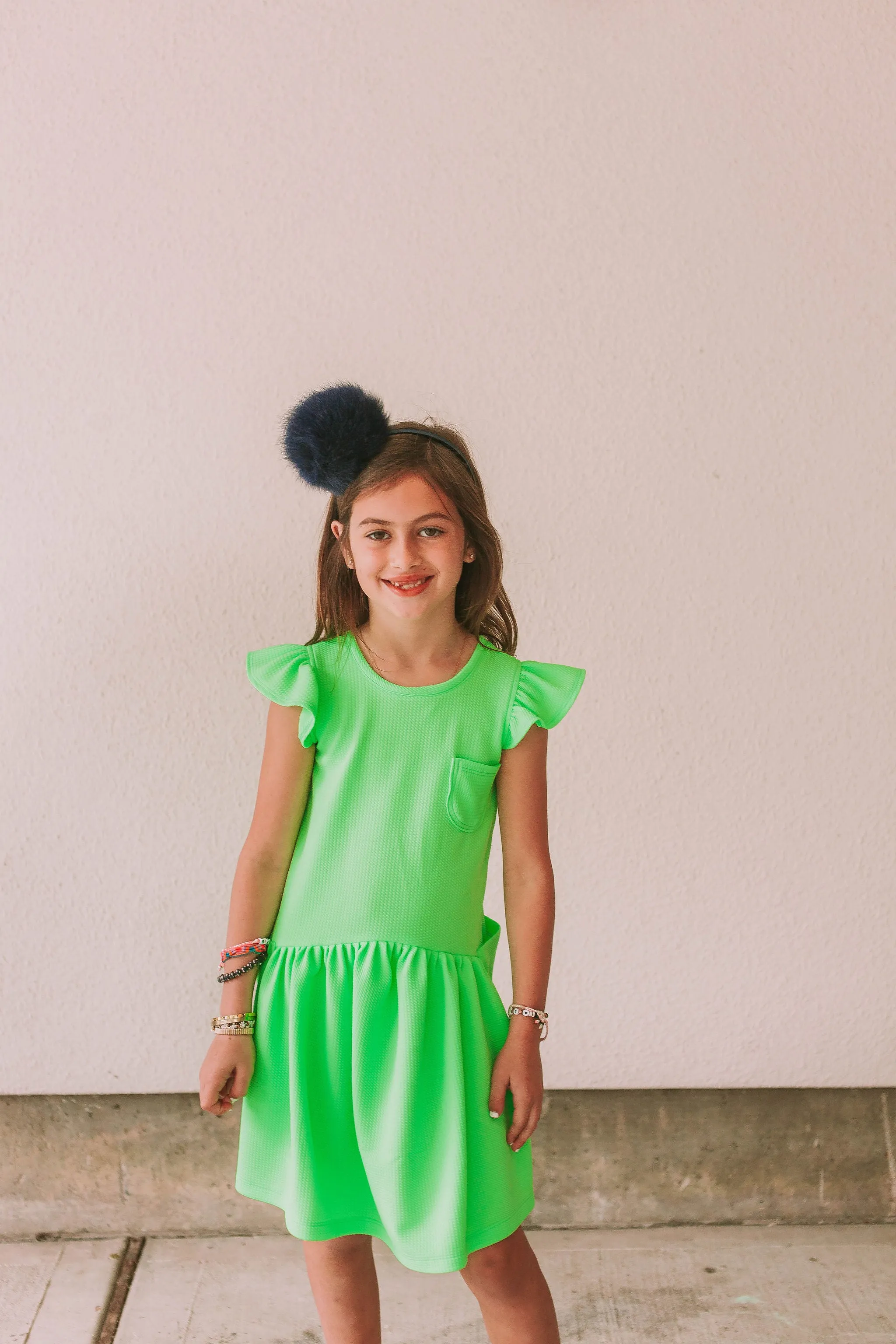 Little Girl's Neon Green Bullet Knit Cotton Three Pocket Dress