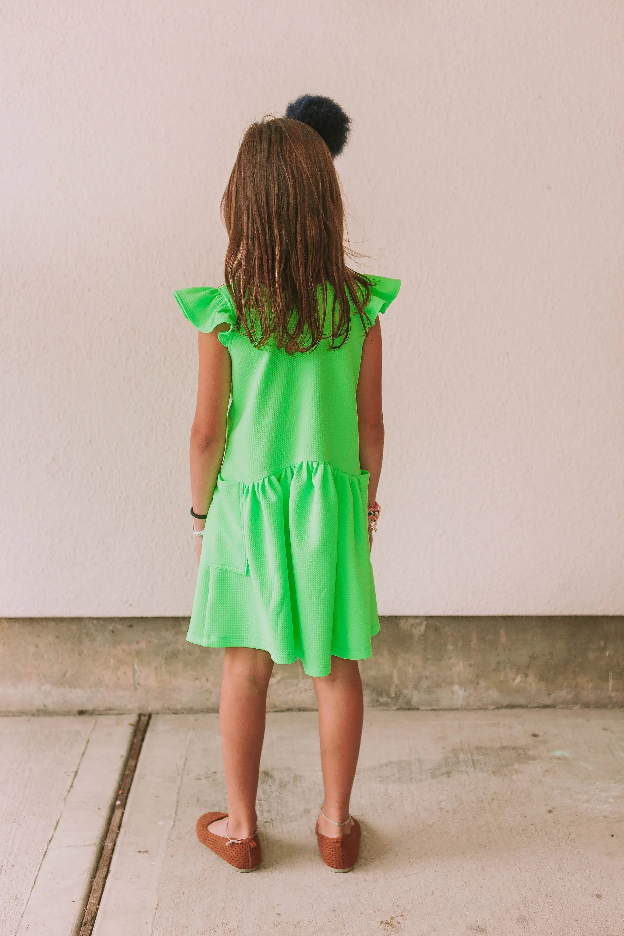 Little Girl's Neon Green Bullet Knit Cotton Three Pocket Dress