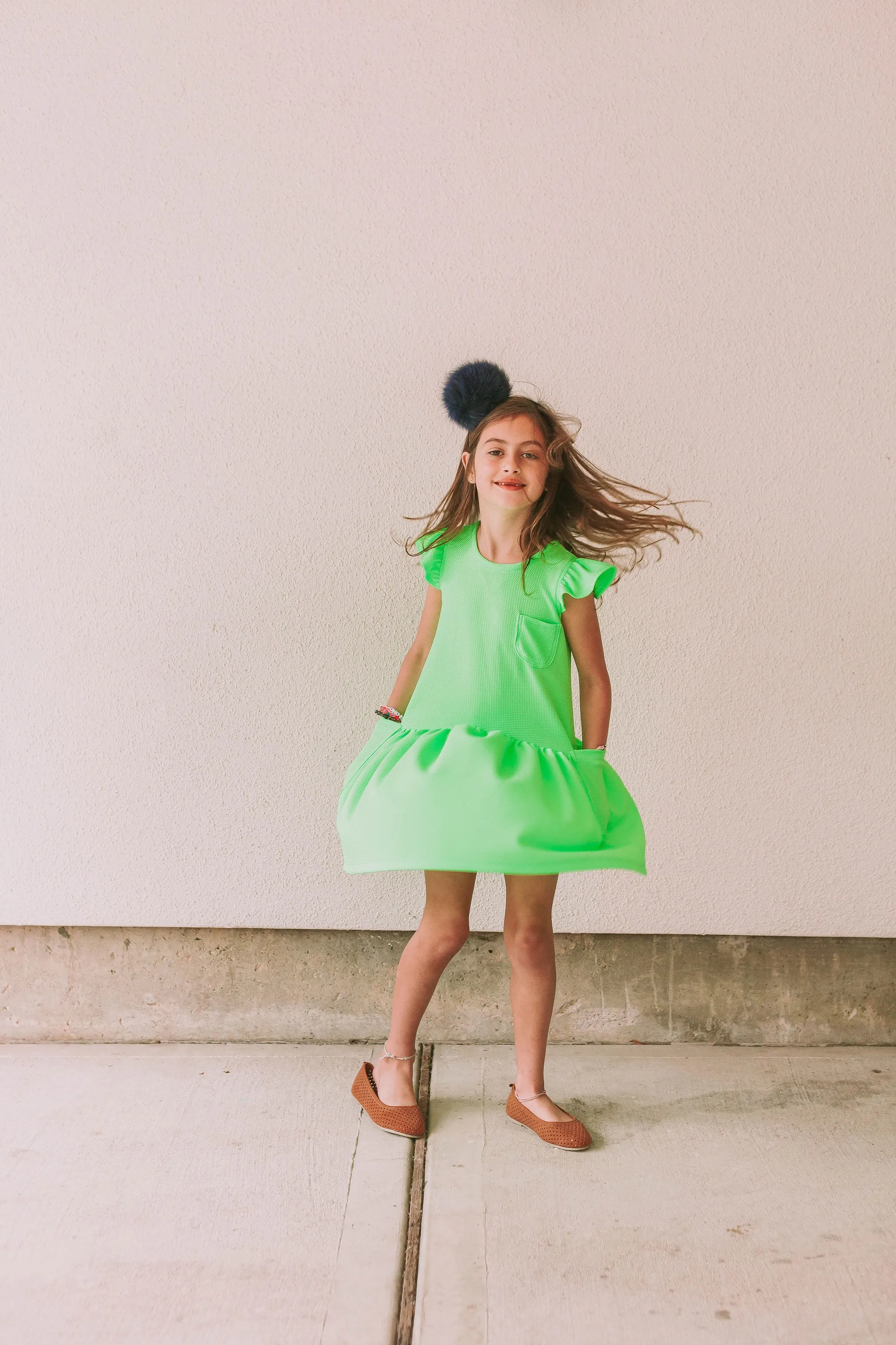 Little Girl's Neon Green Bullet Knit Cotton Three Pocket Dress