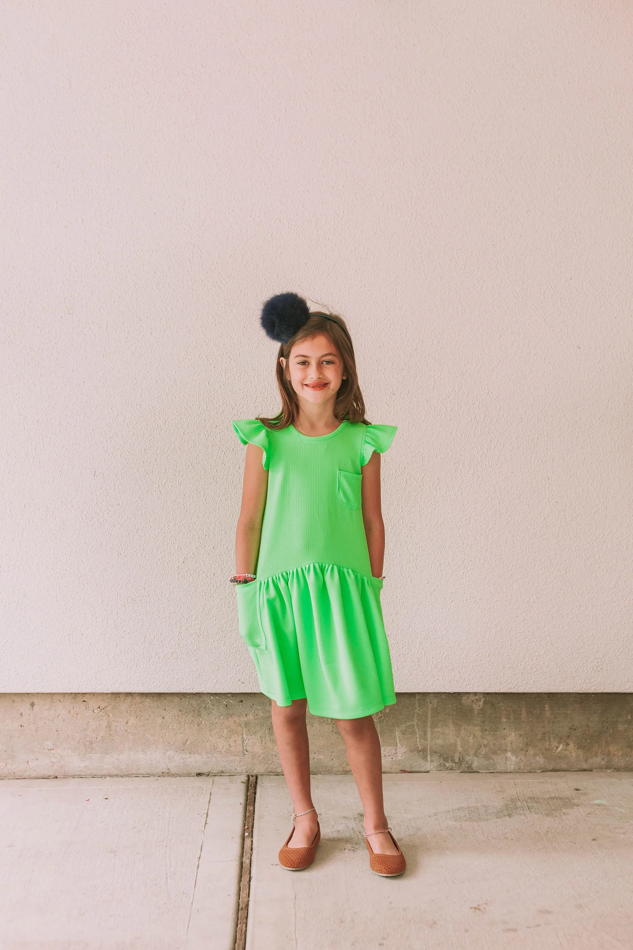 Little Girl's Neon Green Bullet Knit Cotton Three Pocket Dress