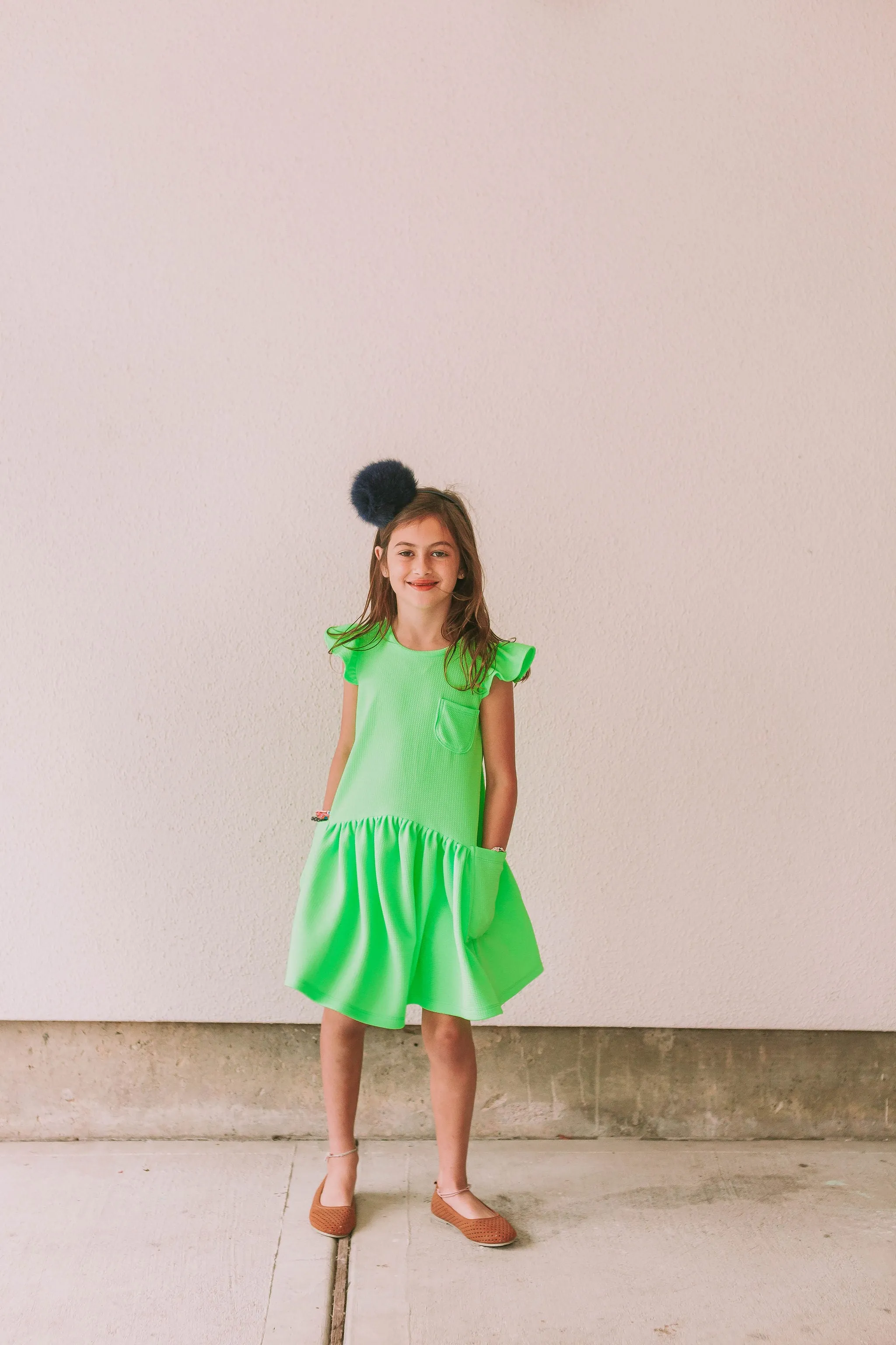 Little Girl's Neon Green Bullet Knit Cotton Three Pocket Dress