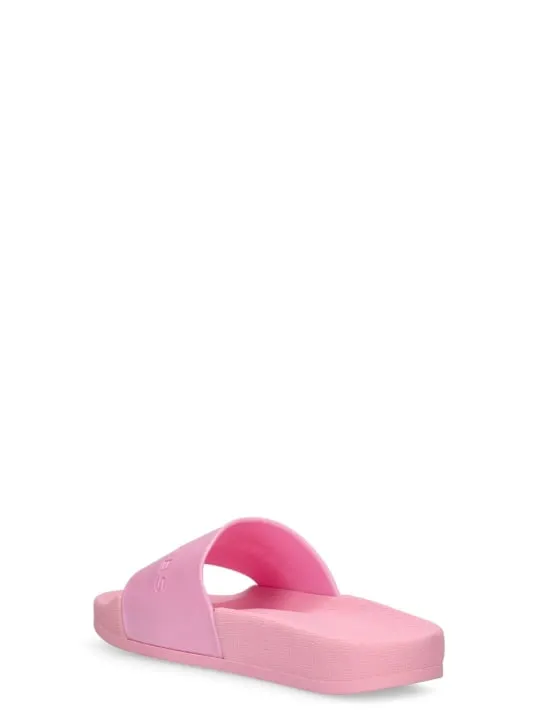 Marc Jacobs   Monochromatic rubber slides 