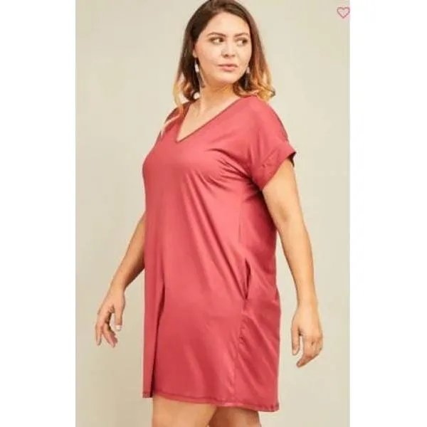 Solid v-neck dress featuring pocket detail