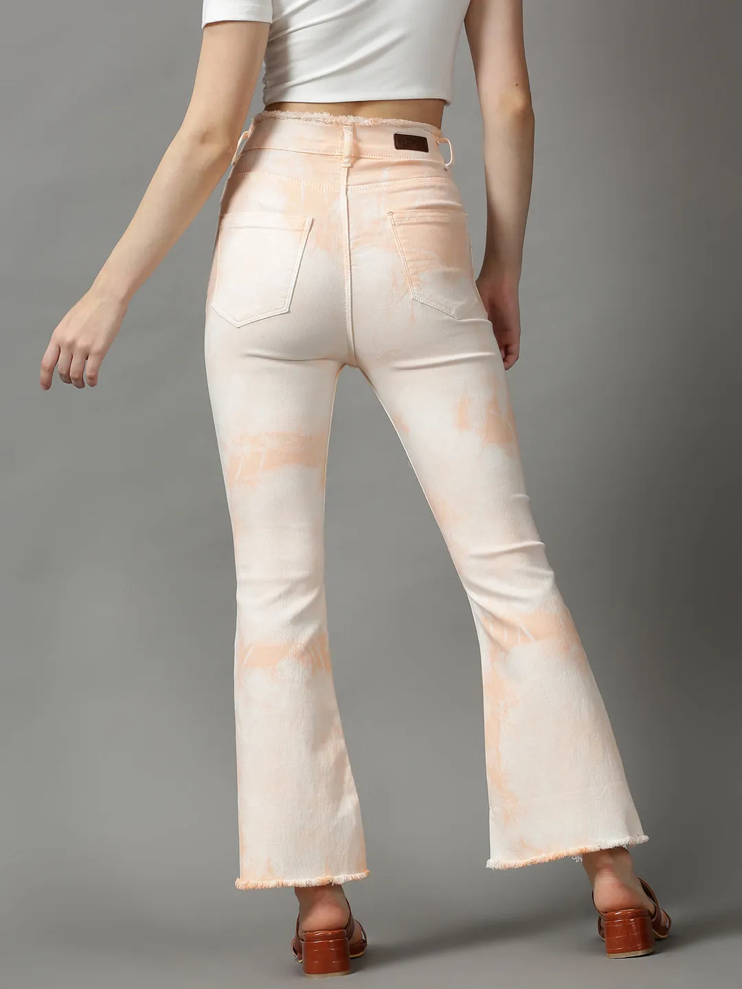 Women's Peach Solid Bootcut Denim Jeans